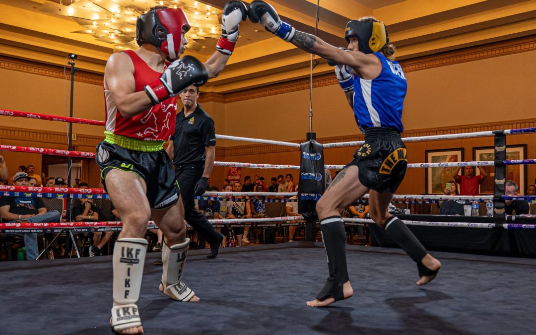 Photo showing two athletes touching gloves at the 2022 US Open Muay Thai Championships